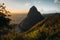 Pitons on Santa Lucia, La Souffriere bay during sunset with blue sky and cotton candy clouds. Caribbean Island. Vieux