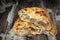 Pitta Bread Loaf Torn In Half Set On Old Cracked Wooden Garden T