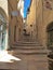 Pittoresque narrow alley with southern flair of mediterranean university city Montpellier in Southern France