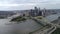 Pittsburgh Cityscape in cloudy day, Pennsylvania. Daytime with business district and river with three bridges in background. Fort