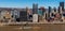 Pittsburgh, Pennsylvania, USA February 20, 2022 A tow boat pushing four barges up a muddy Monongahela River