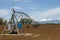 Pivot Irrigation System in a farming field with Longs Peak Mount