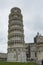 PIZA, ITALY - 10 MARCH, 2016: View of Leaning tower and the Basilica, Piazza dei miracoli, Pisa, Italy