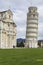 PIZA, ITALY - 10 MARCH, 2016: View of Leaning tower and the Basilica, Piazza dei miracoli, Pisa, Italy