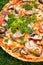 Pizza on a background of green grass