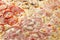 Pizza background - macro shot of italian pizza Four seasons