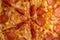 Pizza background - macro shot of pepperoni pizza