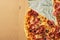 Pizza with bacon in a cardboard box. Close-up. Top View. Pizza delivery. Pizza menu