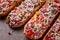 Pizza on a baguette, top view, close-up, no people, fast food, street food,