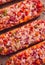 Pizza on a baguette, top view, close-up, no people, fast food, street food,