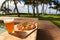 Pizza and beer by the poolside in Hawaii