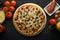 Pizza on a black background with ingredients, tomatoes, salami, mushrooms, sauce and mazzarella cheese. Italian pizza, culinary