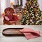 Pizza board, with napkin on wooden table. Top view mockup. Festive sparkling Christmas interiors background