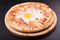 Pizza carbonara with bacon and raw hicken egg