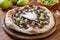 Pizza chocolate pears and kiwi on rustic