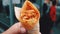 Pizza cone, delicious street fast food in hand with tasty meat , generated AI