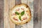 Pizza is a culinary preparation that consists of a flat bread, usually circular