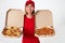 pizza delivery girl showing pizza inside boxes