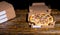 Pizza with ham, mushrooms, onion and pickles in a box