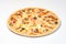 Pizza with ham and Sun-dried tomatoes on a white background