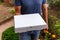 Pizza home Delivery, men holding white cardboard box