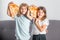 Pizza and kids, slices pizza in kids hand. Children eating tasty fast food pizza with cheese. Happy kids holding pizza