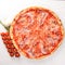 Pizza Lardon. Bacon, cherry tomatoes, sausage salami. On a wooden background