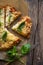 Pizza Margherita on wooden  background top view. Pizza Margarita with vegetable  Basil and Mozzarella Cheese close up.