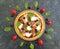 Pizza, olives, tomatoes recipe ingredients  homemade concrete background