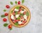 Pizza, olives, tomatoes traditional preparation recipe concrete background