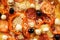 Pizza with paprika, olives and champignons