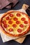 Pizza with pepperoni and cheese. Fast food. Italian cuisine. American food