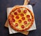 Pizza with pepperoni and cheese. Fast food. Italian cuisine. American food