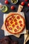 Pizza with pepperoni and cheese. Fast food. Italian cuisine. American food