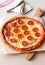 Pizza with pepperoni and cheese. Fast food. Italian cuisine. American food