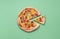 Pizza primavera and one slice. Single piece of vegetarian pizza