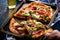 Pizza with prosciutto, mozzarella, mushroom and rocket salad wit