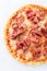 Pizza with prosciutto (parma ham) on white background top view