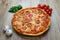 Pizza salami and mozzarella chesse top angle
