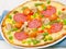 Pizza with salami, mushrooms and vegetables