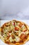 Pizza seafood spicy on white box , online delivery take away