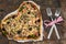 Pizza in the shape of a heart. Romantic dinner. Old table. Top view. Close-up