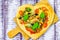 Pizza shape heart wooden background