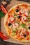 Pizza with shrimp, salmon and olives