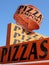 Pizza Sign large text red orange signboard in restaurant on street