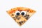 Pizza slice with googly eyes on white background