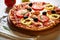 Pizza with tomatoes, pepper and ham