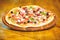 Pizzeria restaurant. Delicious hot pizza on wooden board plate. Food delivery service. Pizza served with dill. Pizza