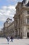 Place Carrousel, Louvre. Tourists walk and take pictures