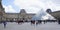 Place Carrousel, Louvre. Tourists walk and take pictures